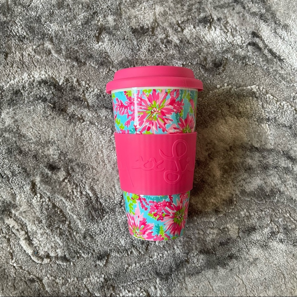 NWOT ceramic travel mug with silicon lid
